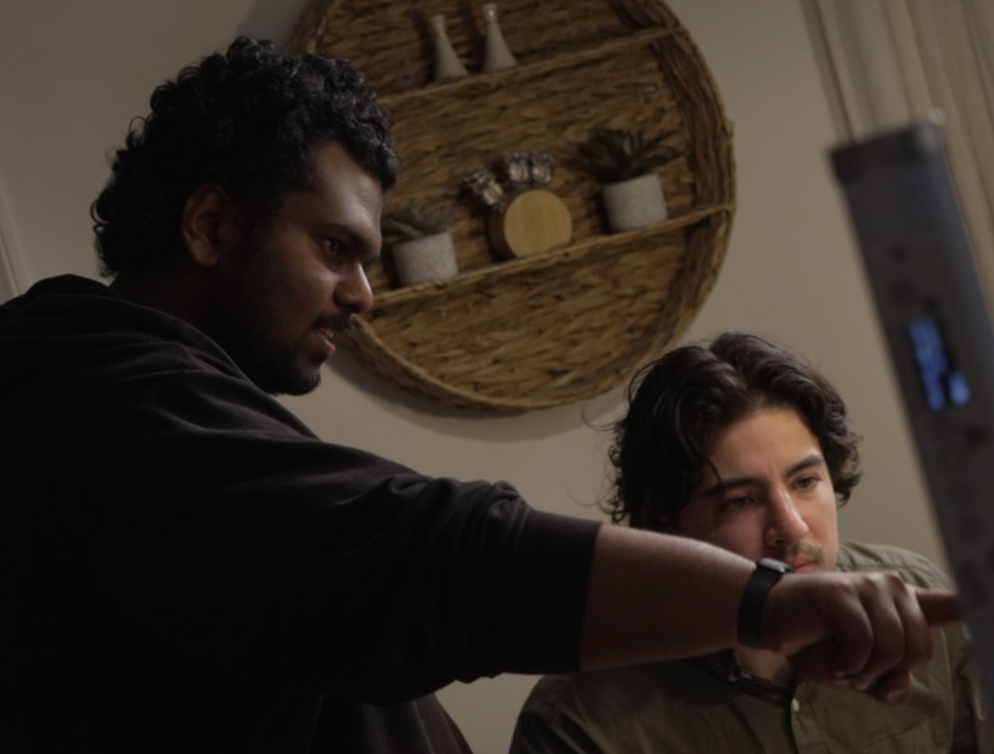 Director and actor discussing a shot